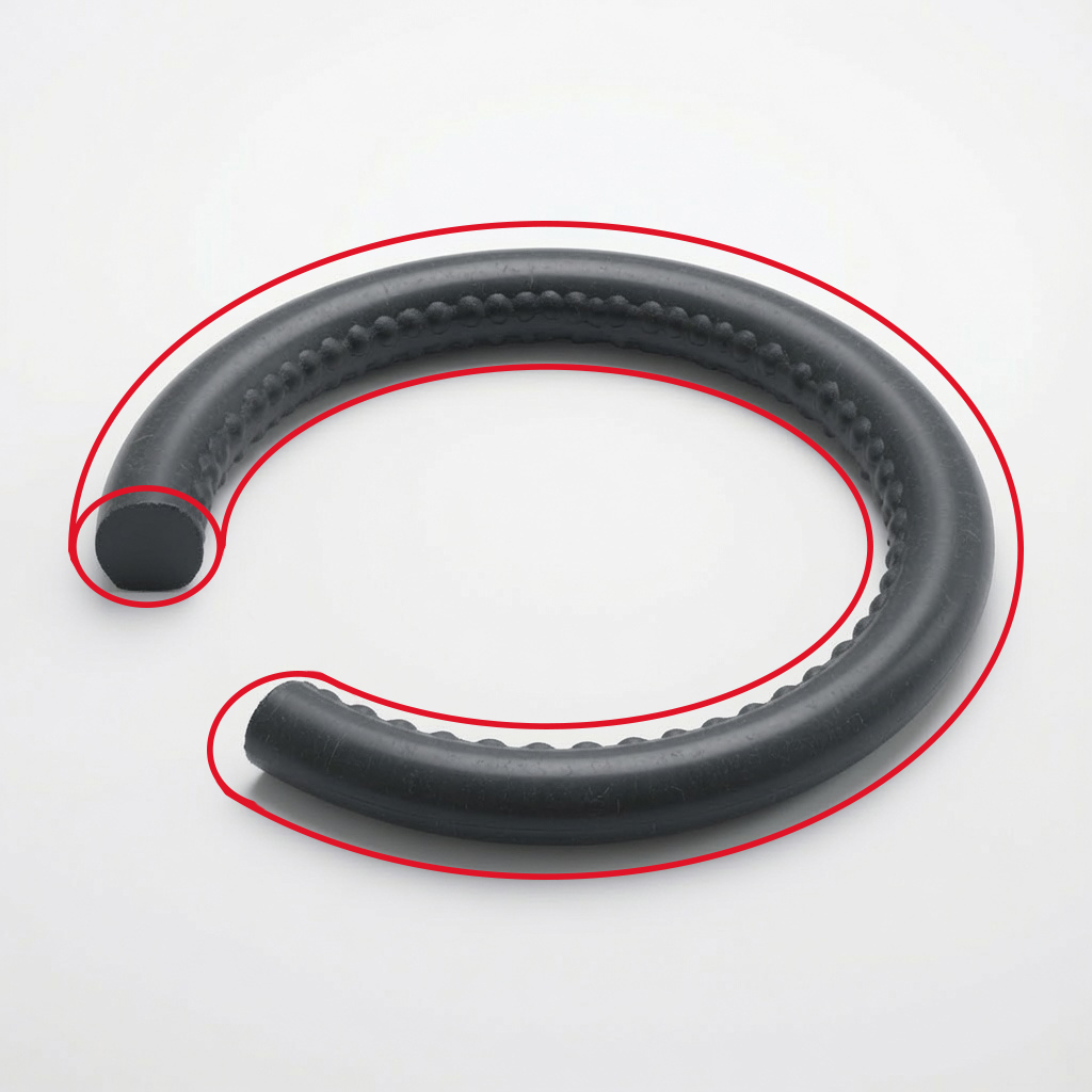 O-Ring with extrusion beads and a flattened cord from pressure forcing rubber into the clearance gap